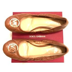 Micheal Kors quilted tan ballerina flats.